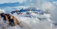 Dolomites peaking out of the clouds